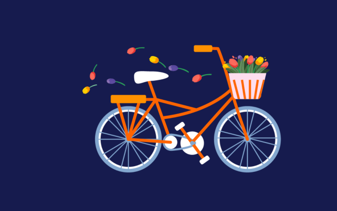 Orange bicycle with a pink and white striped basket full of tulips